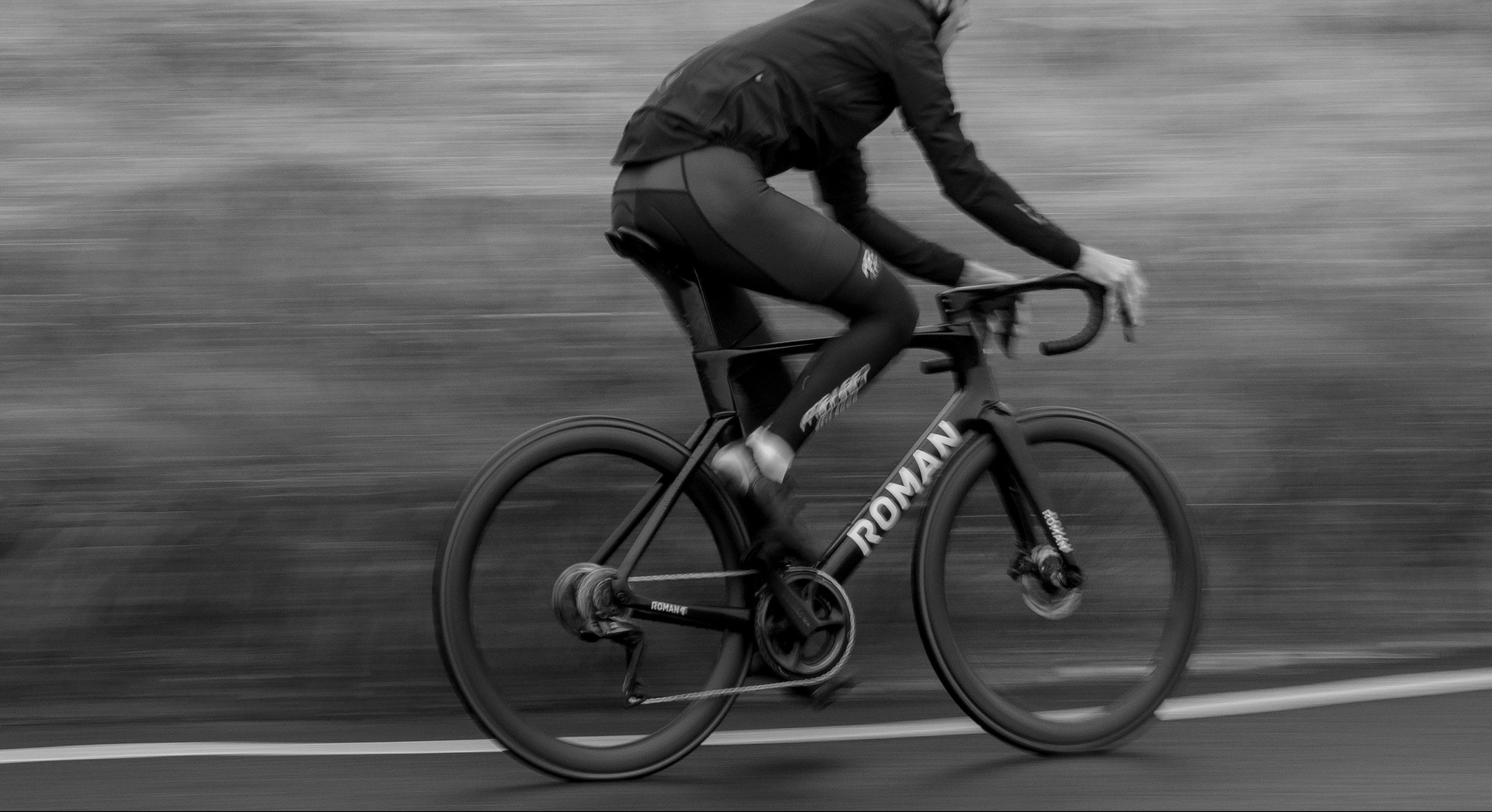 Roman Bike Riding Fast In the Rain